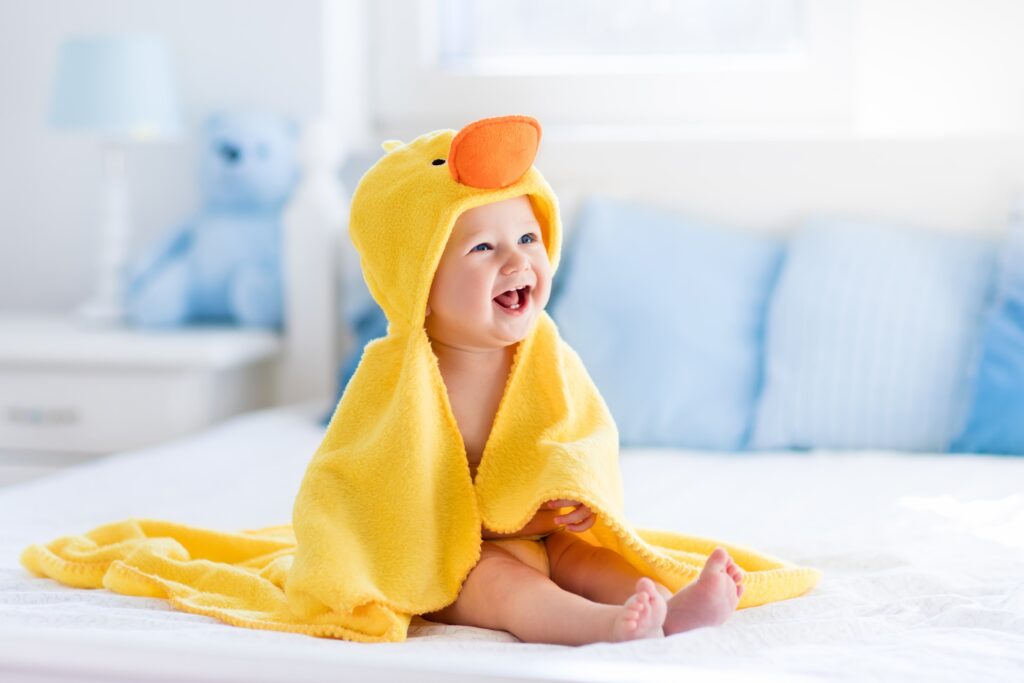 happy baby in a duck costume