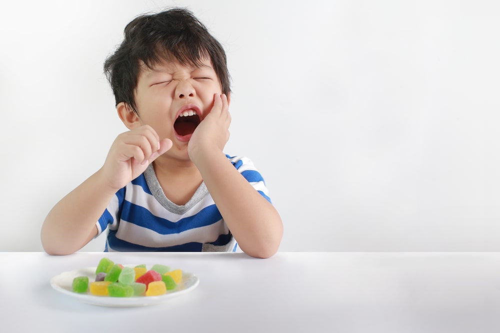 boy with tooth pain